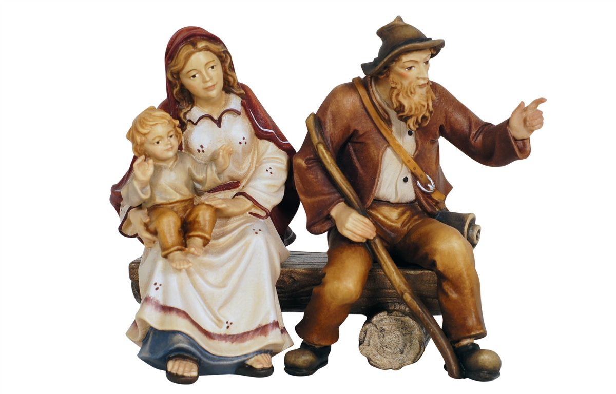 Belén de Kostner: Pastora con niño y pastor sentado señalando un banco