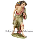 Niño tirando del belén de Kostner