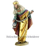 Niño tirando del belén de Kostner