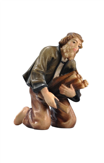 Kostner Nativity Shepherd kneeling at the campfire