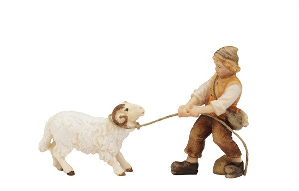 Kostner Krippe Junge ziehend mit Schafbock