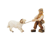Kostner Krippe Junge ziehend mit Schafbock