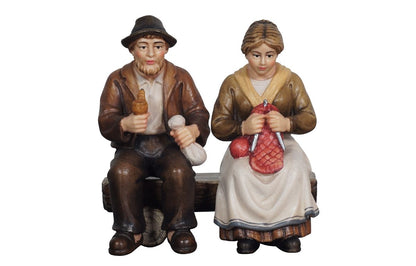 Kostner Nativity Grandma and Grandpa on a Bench